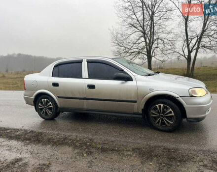 Серый Опель Астра, объемом двигателя 1.39 л и пробегом 223 тыс. км за 3800 $, фото 3 на Automoto.ua