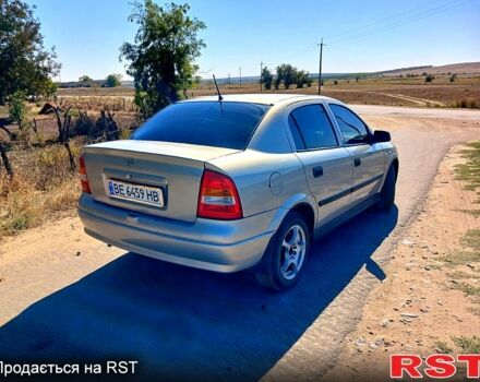 Серый Опель Астра, объемом двигателя 1.4 л и пробегом 250 тыс. км за 3100 $, фото 3 на Automoto.ua