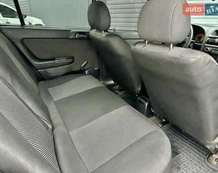 Серый Опель Астра, объемом двигателя 1.39 л и пробегом 240 тыс. км за 2800 $, фото 10 на Automoto.ua