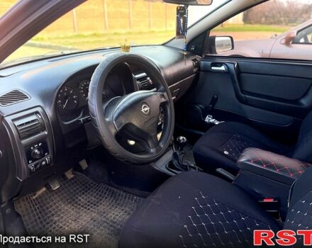 Серый Опель Астра, объемом двигателя 1.4 л и пробегом 212 тыс. км за 3000 $, фото 6 на Automoto.ua