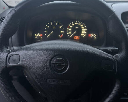 Серый Опель Астра, объемом двигателя 1.4 л и пробегом 300 тыс. км за 5000 $, фото 11 на Automoto.ua