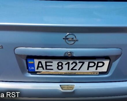 Серый Опель Астра, объемом двигателя 1.4 л и пробегом 215 тыс. км за 3800 $, фото 4 на Automoto.ua