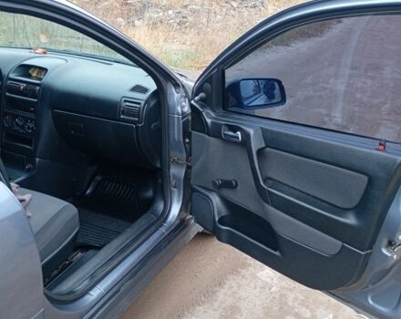 Серый Опель Астра, объемом двигателя 1.4 л и пробегом 210 тыс. км за 3200 $, фото 10 на Automoto.ua