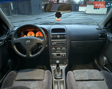 Серый Опель Астра, объемом двигателя 1.4 л и пробегом 269 тыс. км за 2200 $, фото 9 на Automoto.ua