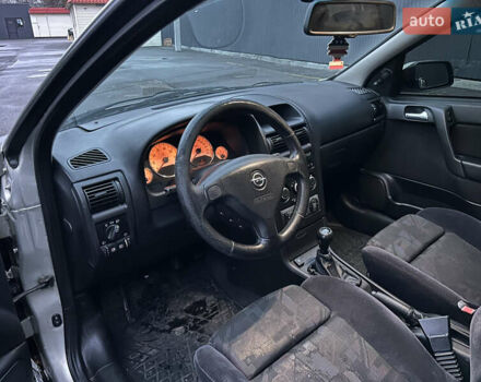 Серый Опель Астра, объемом двигателя 1.4 л и пробегом 269 тыс. км за 2200 $, фото 8 на Automoto.ua