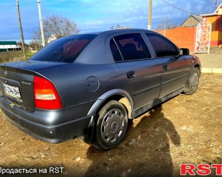 Серый Опель Астра, объемом двигателя 1.4 л и пробегом 212 тыс. км за 3000 $, фото 2 на Automoto.ua