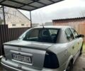 Серый Опель Астра, объемом двигателя 1.4 л и пробегом 295 тыс. км за 3700 $, фото 4 на Automoto.ua
