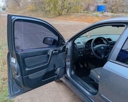 Серый Опель Астра, объемом двигателя 1.4 л и пробегом 210 тыс. км за 3200 $, фото 1 на Automoto.ua