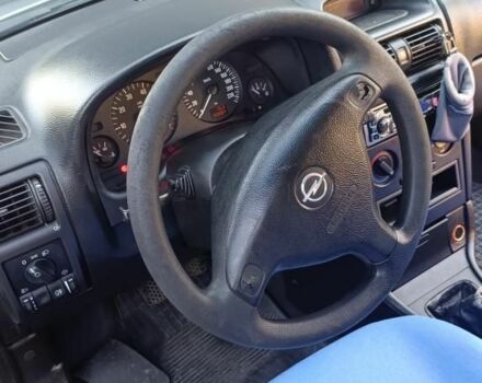 Серый Опель Астра, объемом двигателя 1.4 л и пробегом 195 тыс. км за 3300 $, фото 5 на Automoto.ua