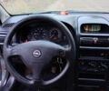 Серый Опель Астра, объемом двигателя 1.4 л и пробегом 210 тыс. км за 3200 $, фото 1 на Automoto.ua