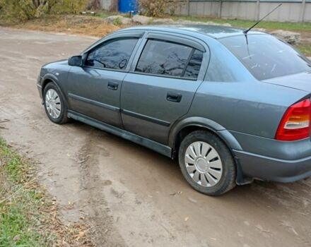 Серый Опель Астра, объемом двигателя 1.4 л и пробегом 210 тыс. км за 3200 $, фото 8 на Automoto.ua