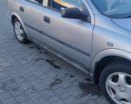 Серый Опель Астра, объемом двигателя 1.4 л и пробегом 195 тыс. км за 3300 $, фото 2 на Automoto.ua