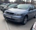 Серый Опель Астра, объемом двигателя 1.4 л и пробегом 224 тыс. км за 2300 $, фото 1 на Automoto.ua
