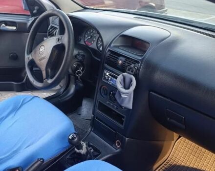 Серый Опель Астра, объемом двигателя 1.4 л и пробегом 195 тыс. км за 3300 $, фото 4 на Automoto.ua