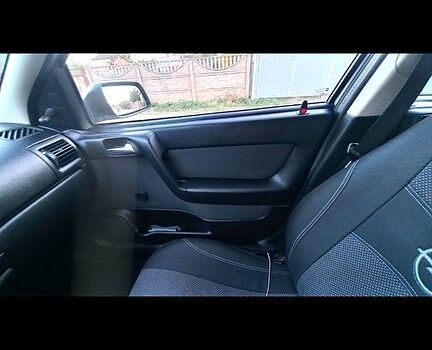 Серый Опель Астра, объемом двигателя 1.4 л и пробегом 215 тыс. км за 3800 $, фото 8 на Automoto.ua