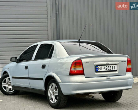 Серый Опель Астра, объемом двигателя 1.39 л и пробегом 240 тыс. км за 2800 $, фото 2 на Automoto.ua