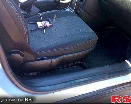 Серый Опель Астра, объемом двигателя 1.4 л и пробегом 215 тыс. км за 3800 $, фото 3 на Automoto.ua