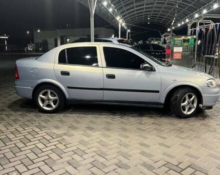 Серый Опель Астра, объемом двигателя 1.4 л и пробегом 146 тыс. км за 3600 $, фото 5 на Automoto.ua