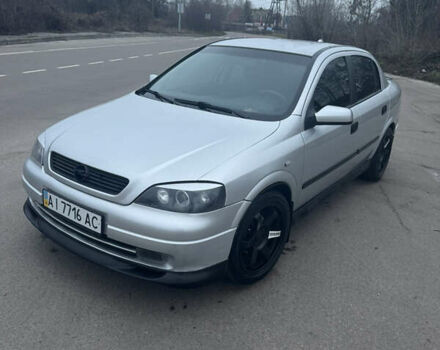 Серый Опель Астра, объемом двигателя 1.4 л и пробегом 300 тыс. км за 5000 $, фото 1 на Automoto.ua