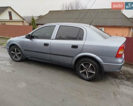 Серый Опель Астра, объемом двигателя 1.4 л и пробегом 197 тыс. км за 3350 $, фото 6 на Automoto.ua