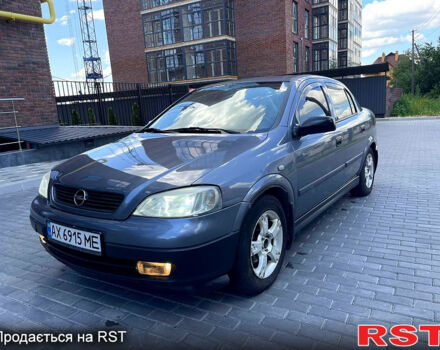 Серый Опель Астра, объемом двигателя 1.4 л и пробегом 250 тыс. км за 2999 $, фото 1 на Automoto.ua