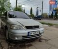 Серый Опель Астра, объемом двигателя 1.4 л и пробегом 210 тыс. км за 3100 $, фото 1 на Automoto.ua
