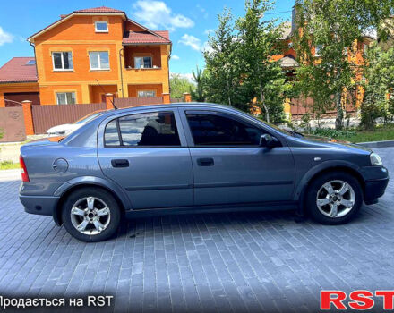 Серый Опель Астра, объемом двигателя 1.4 л и пробегом 250 тыс. км за 2999 $, фото 5 на Automoto.ua