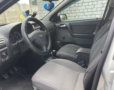 Серый Опель Астра, объемом двигателя 1.4 л и пробегом 172 тыс. км за 3500 $, фото 5 на Automoto.ua