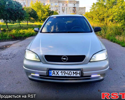 Серый Опель Астра, объемом двигателя 1.4 л и пробегом 198 тыс. км за 3500 $, фото 3 на Automoto.ua