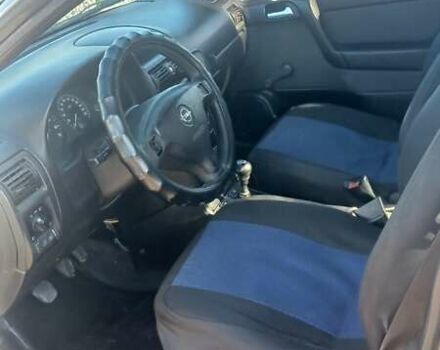 Серый Опель Астра, объемом двигателя 1.4 л и пробегом 400 тыс. км за 2300 $, фото 9 на Automoto.ua