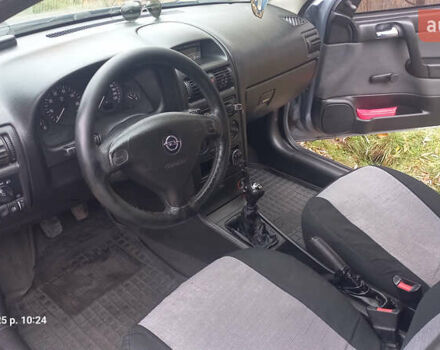 Серый Опель Астра, объемом двигателя 1.4 л и пробегом 212 тыс. км за 3900 $, фото 6 на Automoto.ua