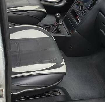 Сірий Опель Астра, об'ємом двигуна 1.4 л та пробігом 205 тис. км за 4840 $, фото 4 на Automoto.ua