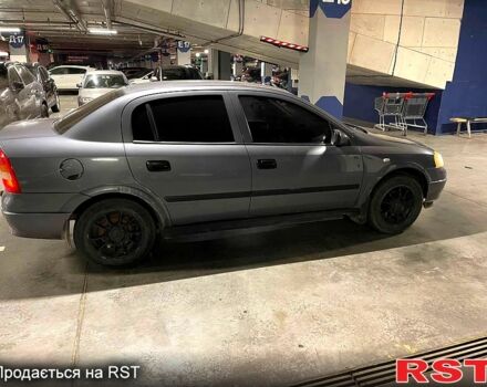 Серый Опель Астра, объемом двигателя 1.4 л и пробегом 263 тыс. км за 2700 $, фото 1 на Automoto.ua