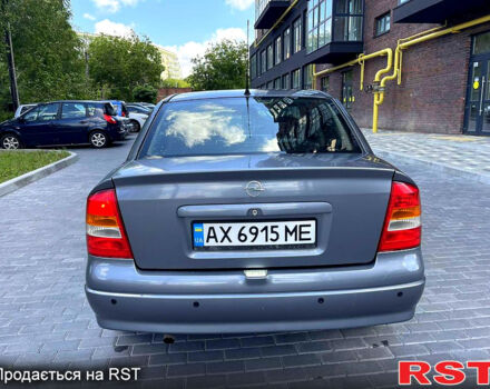 Серый Опель Астра, объемом двигателя 1.4 л и пробегом 250 тыс. км за 2999 $, фото 3 на Automoto.ua