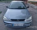 Серый Опель Астра, объемом двигателя 1 л и пробегом 183 тыс. км за 4577 $, фото 1 на Automoto.ua