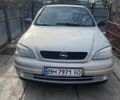 Серый Опель Астра, объемом двигателя 1.39 л и пробегом 111 тыс. км за 4200 $, фото 1 на Automoto.ua