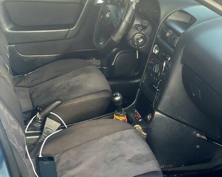 Серый Опель Астра, объемом двигателя 1.4 л и пробегом 350 тыс. км за 4000 $, фото 7 на Automoto.ua