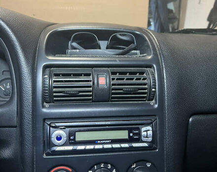 Серый Опель Астра, объемом двигателя 1.4 л и пробегом 351 тыс. км за 3600 $, фото 10 на Automoto.ua