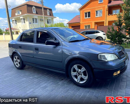 Серый Опель Астра, объемом двигателя 1.4 л и пробегом 250 тыс. км за 2999 $, фото 9 на Automoto.ua