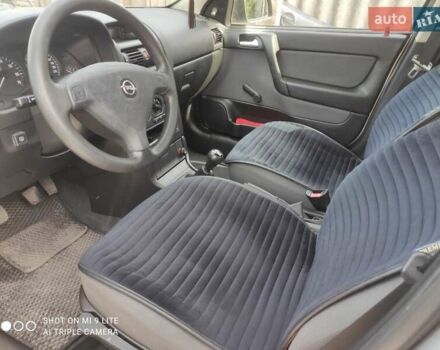 Серый Опель Астра, объемом двигателя 1.4 л и пробегом 216 тыс. км за 3800 $, фото 5 на Automoto.ua