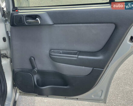 Серый Опель Астра, объемом двигателя 1.36 л и пробегом 77 тыс. км за 3999 $, фото 43 на Automoto.ua