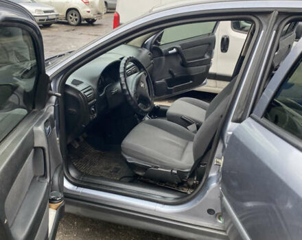 Серый Опель Астра, объемом двигателя 1.4 л и пробегом 283 тыс. км за 3200 $, фото 11 на Automoto.ua