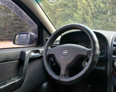 Серый Опель Астра, объемом двигателя 1.4 л и пробегом 260 тыс. км за 3590 $, фото 12 на Automoto.ua