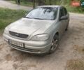Серый Опель Астра, объемом двигателя 1.4 л и пробегом 250 тыс. км за 2400 $, фото 1 на Automoto.ua