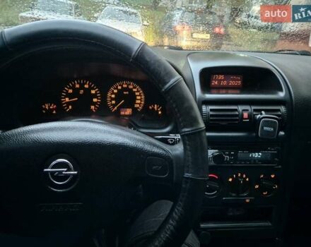 Серый Опель Астра, объемом двигателя 1.4 л и пробегом 361 тыс. км за 3800 $, фото 11 на Automoto.ua