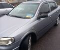 Серый Опель Астра, объемом двигателя 1.4 л и пробегом 256 тыс. км за 3200 $, фото 3 на Automoto.ua