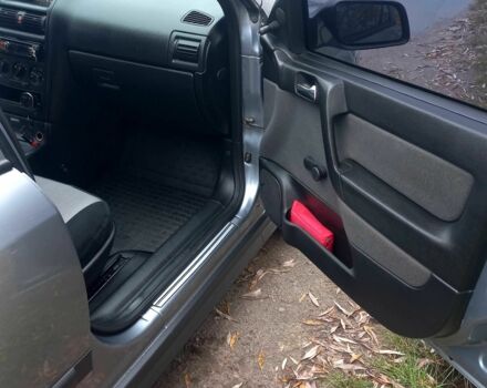 Серый Опель Астра, объемом двигателя 1.4 л и пробегом 212 тыс. км за 4200 $, фото 4 на Automoto.ua