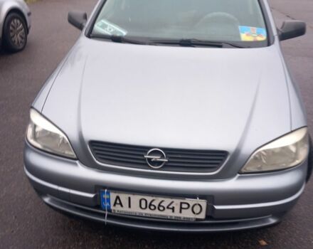 Серый Опель Астра, объемом двигателя 1.4 л и пробегом 256 тыс. км за 3200 $, фото 4 на Automoto.ua