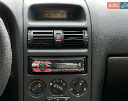 Серый Опель Астра, объемом двигателя 1.36 л и пробегом 77 тыс. км за 3999 $, фото 36 на Automoto.ua