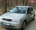 Серый Опель Астра, объемом двигателя 1.4 л и пробегом 184 тыс. км за 4000 $, фото 2 на Automoto.ua